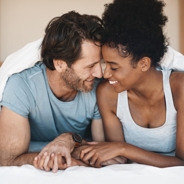couple smiles lovingly at each other